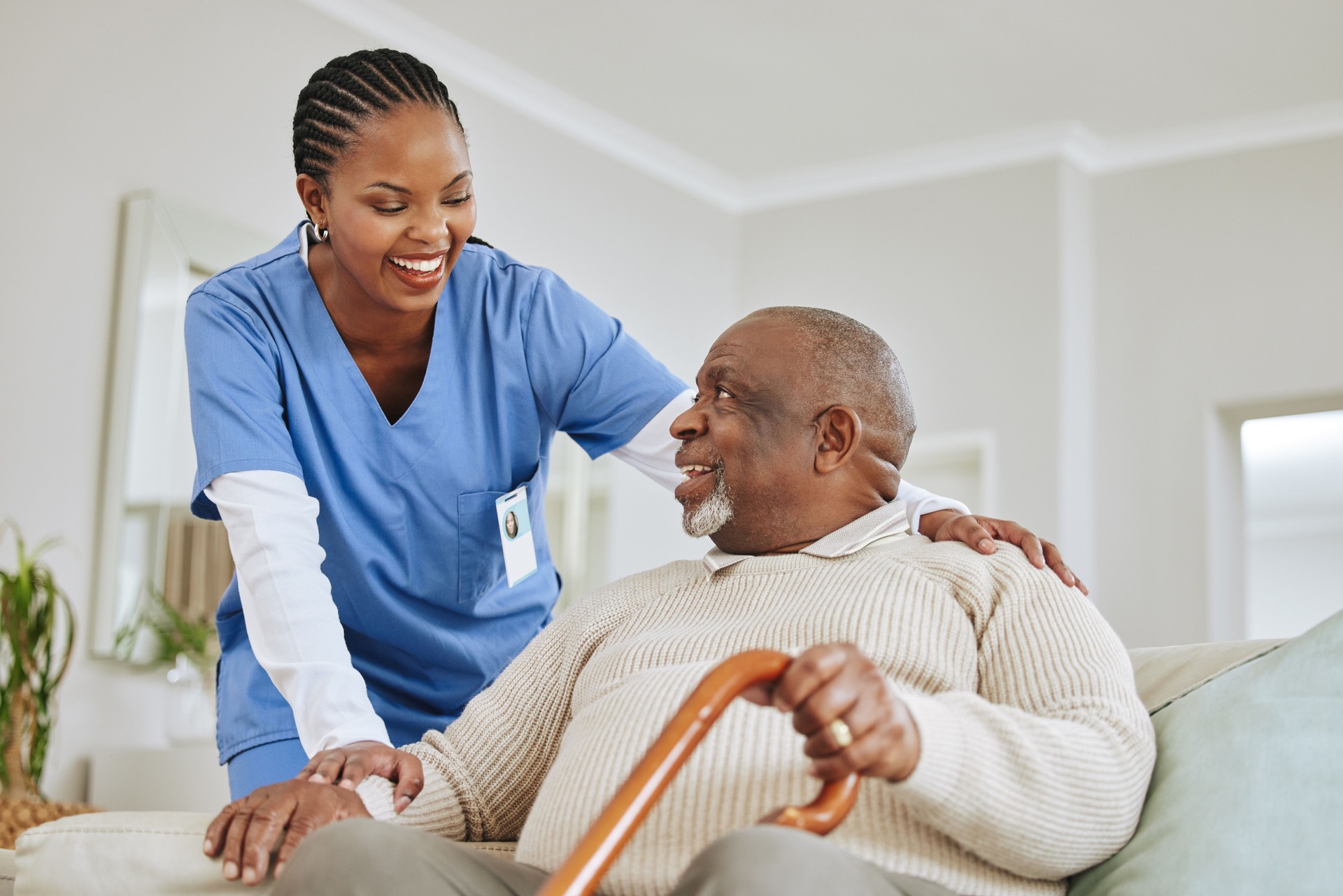 Shot of a nurse speaking to her male patient